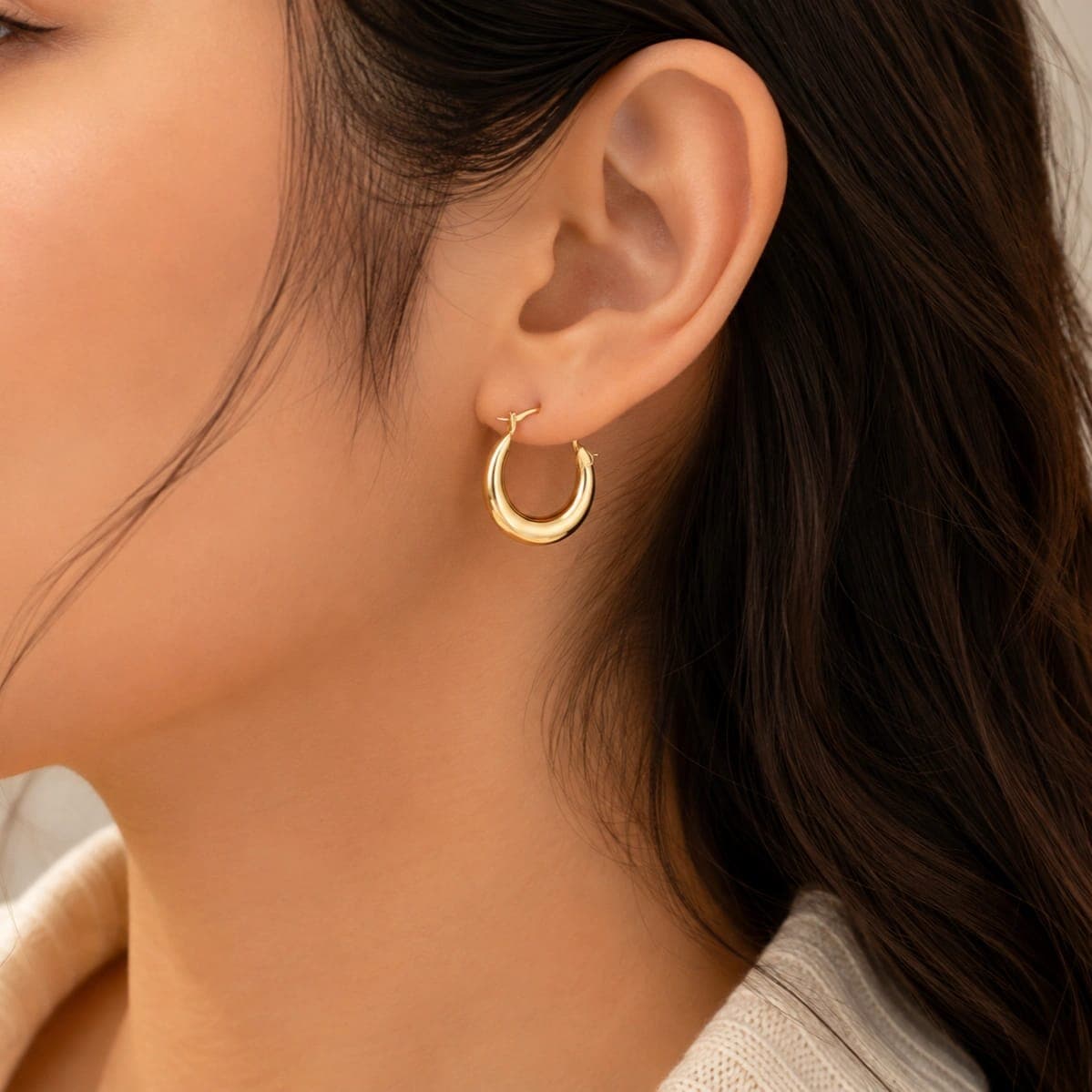 Polished Golden Oval Hoop Earrings